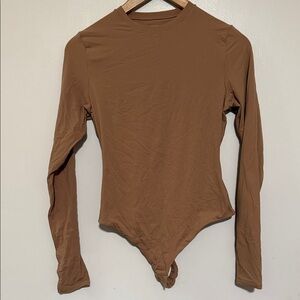 SKIMS Tan Long Sleeve thong bodysuit sz L